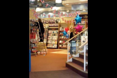 Clintons has set aside £16m to revamp its orange store estate to the new branding